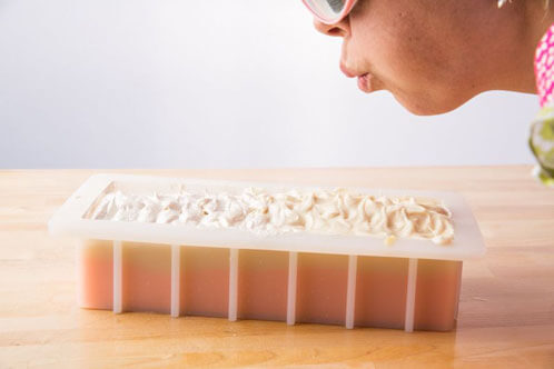 Image by Lara Ferroni Blowing on the Mica - credit Lara Ferroni