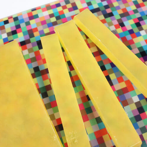 Cutting Yellow Soap into Strips