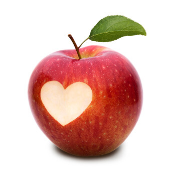 A heart carved in an apple. Apples have a lot of fiber!