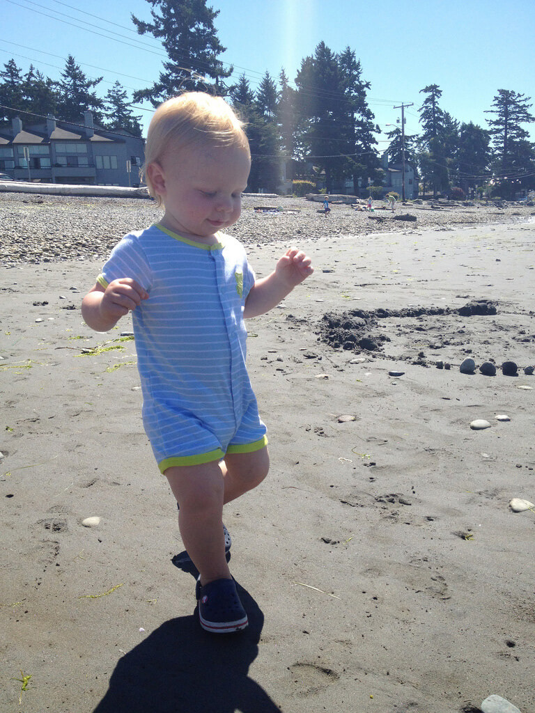 Jamisen walking on the beach.