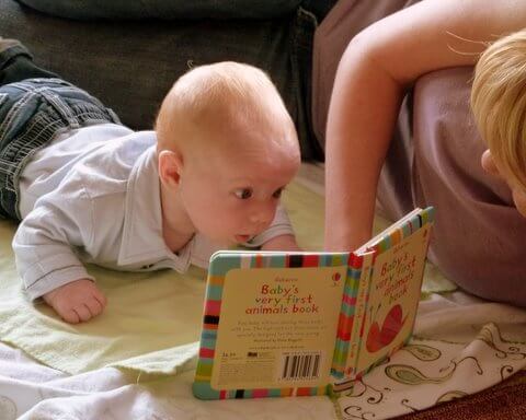 Anne-Marie and Jamisen reading a book