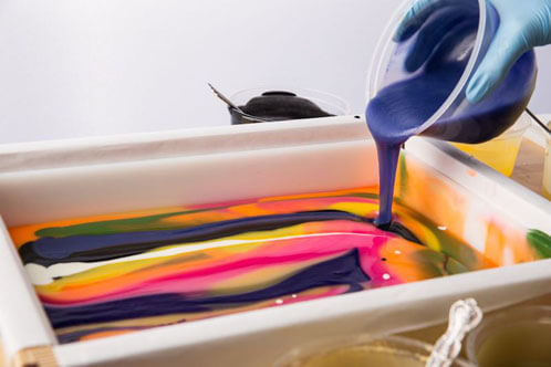 Image by Lara Ferroni Pouring soap into mold - credit Lara Ferroni